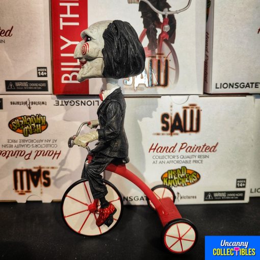 neca-saw-billy-with-tricycle-head-knocker-bobble-head